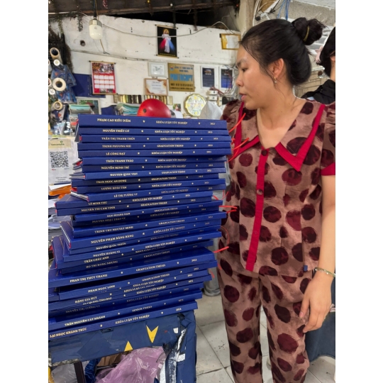 Đóng bìa cứng mạ chữ vàng - tại photocopy Minh Ngọc